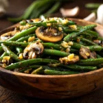 Garlic butter sautéed green beans and mushrooms featured dish