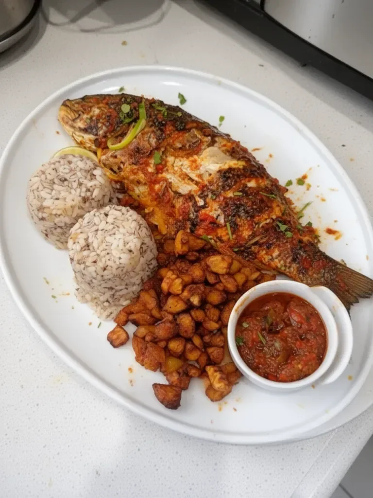 Ofada sauce, fish, and rice