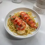 Butter Poached Lobster Tails over Linguine